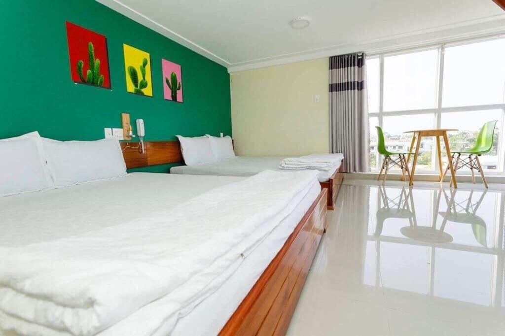 Ngoc Huong Hostel & Apartments Куинён Экстерьер фото
